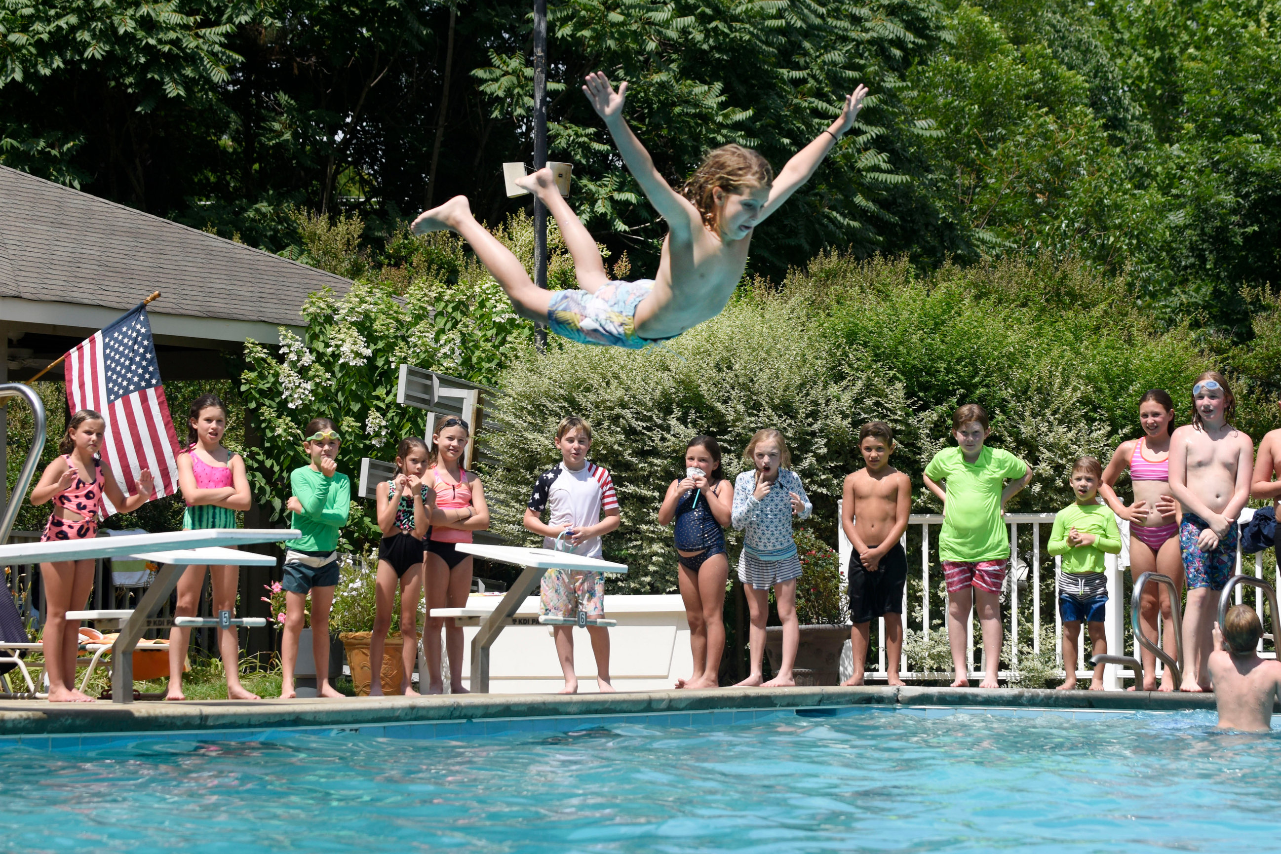 Photo of an teenager doing a belly flop at Friendly Park Swim & Tennis on July 4, 2024